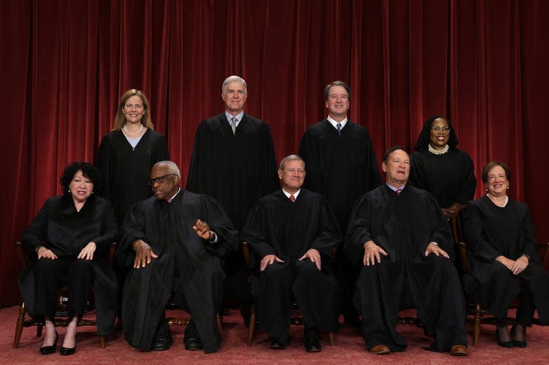 WASHINGTON, DC - OCTOBER 07: United States Supreme Court (front row L-R) Associate Justice Sonia Sotomayor, Associate Justice Clarence Thomas, Chief Justice of the United States John Roberts, Associate Justice Samuel Alito, and Associate Justice Elena Kagan, (back row L-R) Associate Justice Amy Coney Barrett, Associate Justice Neil Gorsuch, Associate Justice Brett Kavanaugh and Associate Justice Ketanji Brown Jackson pose for their official portrait at the East Conference Room of the Supreme Court building on October 7, 2022 in Washington, DC.