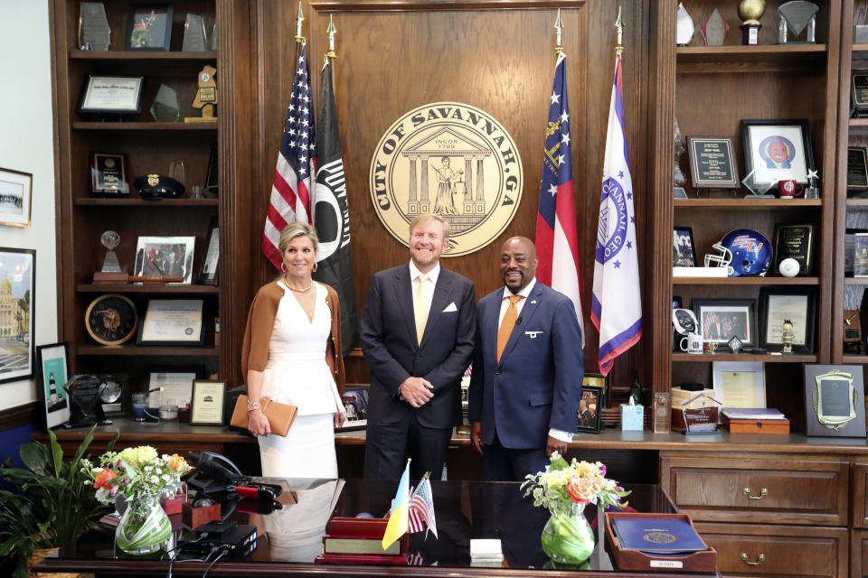 King Willem-Alexander and Queen Maxima, of the Netherlands, and Savannah Mayor Van Johnson pose for a photo in City Hall, Tuesday, June 11, 2024, in Savannah, Ga. The Dutch royals spent the second day of their U.S. tour Tuesday visiting Savannah, Georgia's oldest city that is both a historic gem and a growing powerhouse in global trade. (Richard Burkhart/Savannah Morning News via AP, Pool)