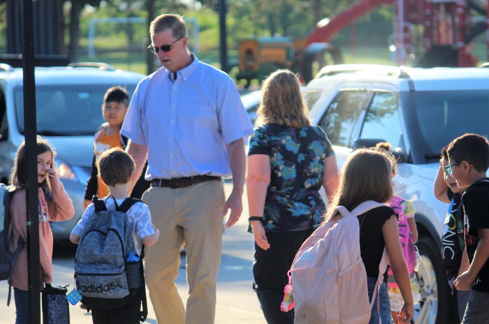 Students arrive at West Ottawa's North Holland Elementary for the first day of the 2022-23 school year Wednesday, Aug. 31.