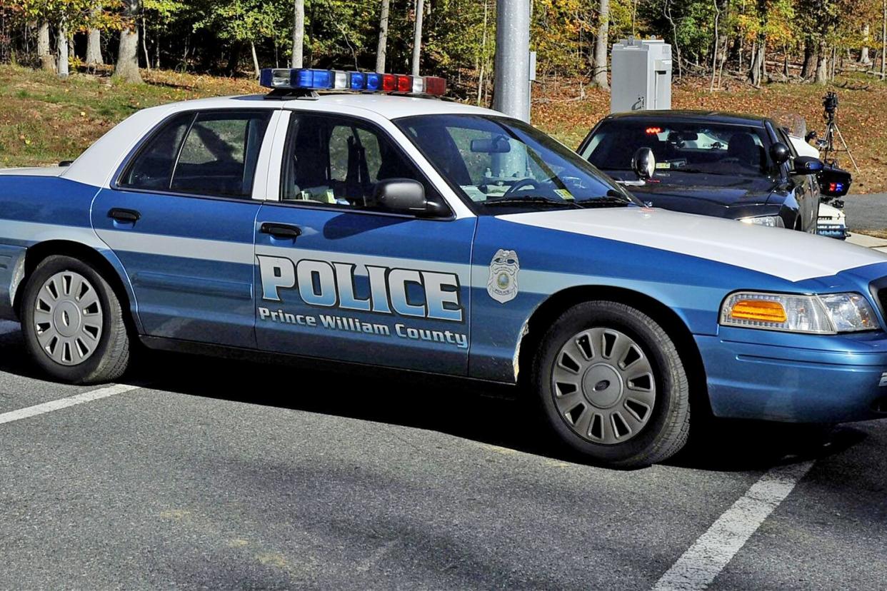 Mandatory Credit: Photo by Roger L Wollenberg/UPI/Shutterstock (12345518c) Prince William County police officers block the entrance to the National Museum of the Marine Corps where shots were fired yesterday in Quantico, Virginia, on October 29, 2010. This is the second time the museum has been targeted. Shots have also been fired at the Pentagon and a military recruiting center over the last two weeks but no one has been injured. Shots fired for second time at Marine Corps museum in Quantico, Virginia, United States - 29 Oct 2010