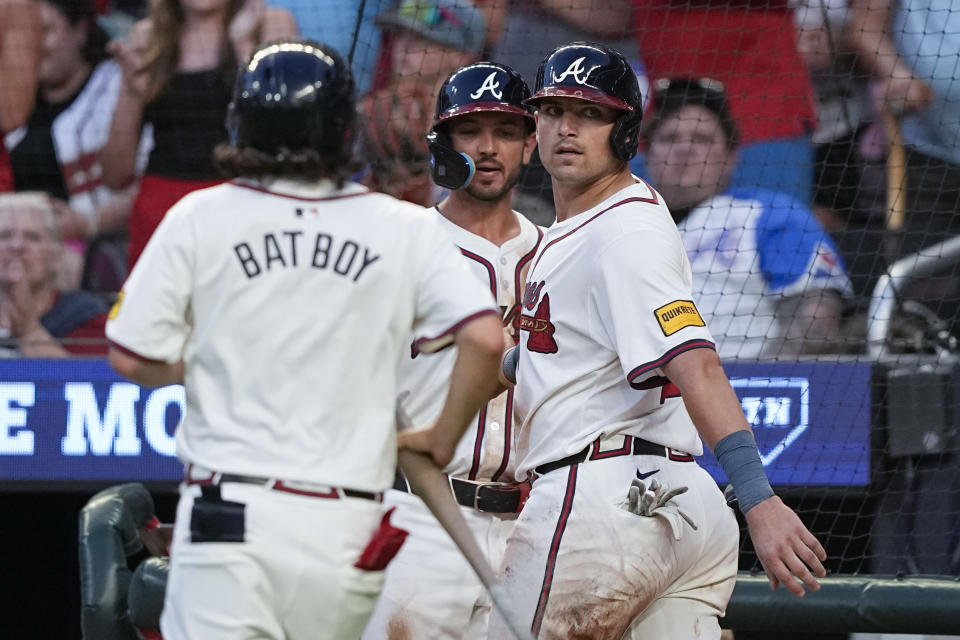 Atlanta Braves' Austin Riley (27) looks back after getting tagged out by San Francisco Giants catcher Curt Casali (18) in the fifth inning of a baseball game, Wednesday, July 3, 2024, in Atlanta. (AP Photo/Brynn Anderson)