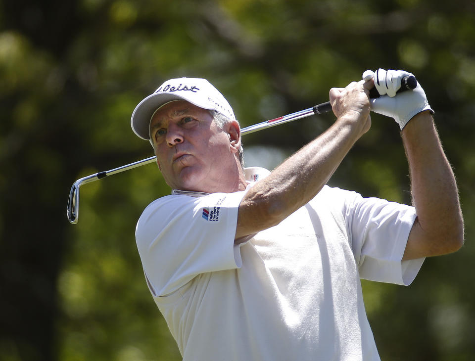 Jay Haas hits from the tee on the second hole during the final round of play in the Greater Gwinnett Championship golf tournament of the Champions Tour, Sunday, April 20, 2014, in Duluth, Ga. (AP Photo/John Bazemore)