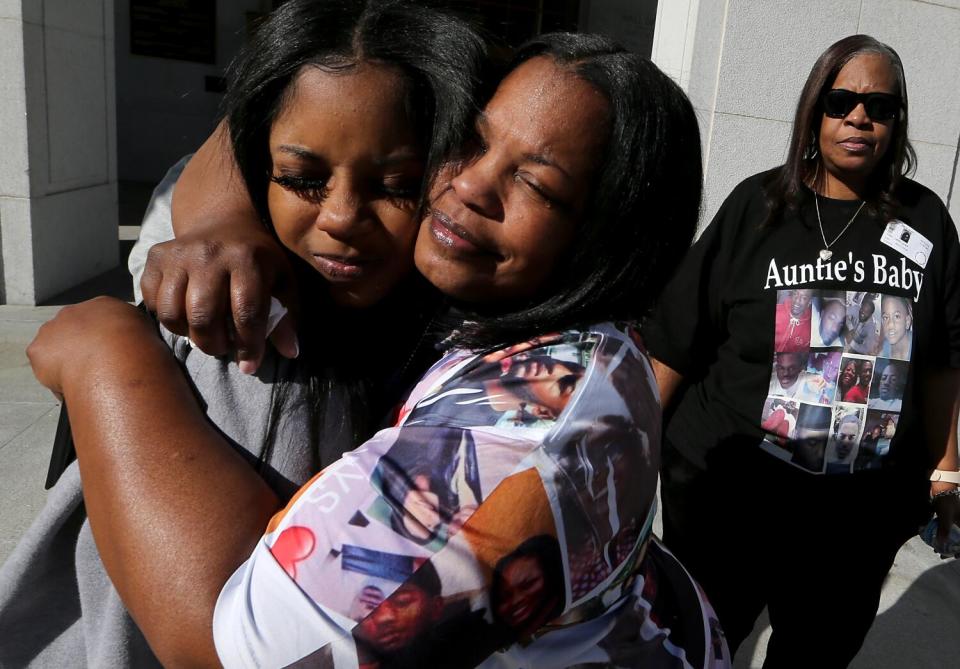 Tommy Fineman hugs her daughter Brianna Twyman after the conviction of Sheriff's Deputy Andy Lyons.