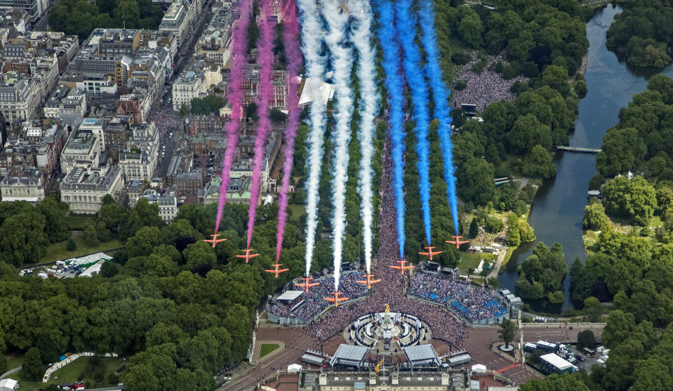 The Red Arrows make a flypast after the Trooping the Color ceremony in London, Thursday June 2, 2022, on the first of four days of celebrations to mark Queen Elizabeth II's Platinum Jubilee. (RAF SAC Sarah Barsby, Ministry of Defence via AP)