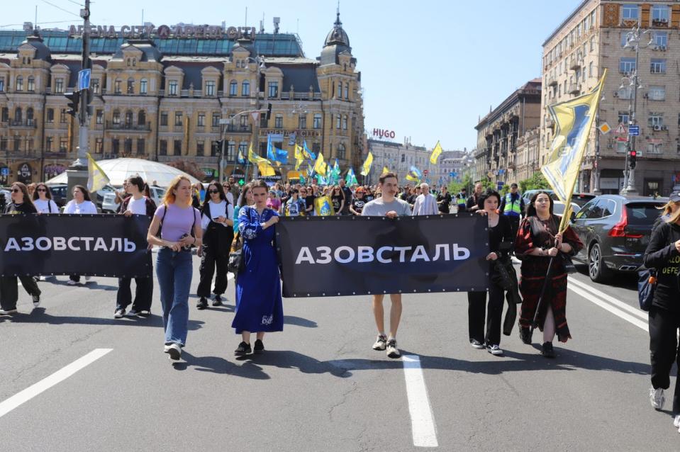 A march through Kyiv’s main Kreshatyk boulevard on the one-year anniversary of the fall of Mariupol (Tom Mutch)