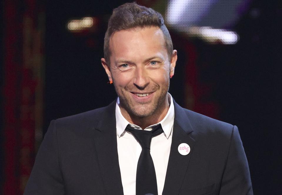 Kevin Winter/Getty  Chris Martin attends 2021 iHeartRadio Music Awards