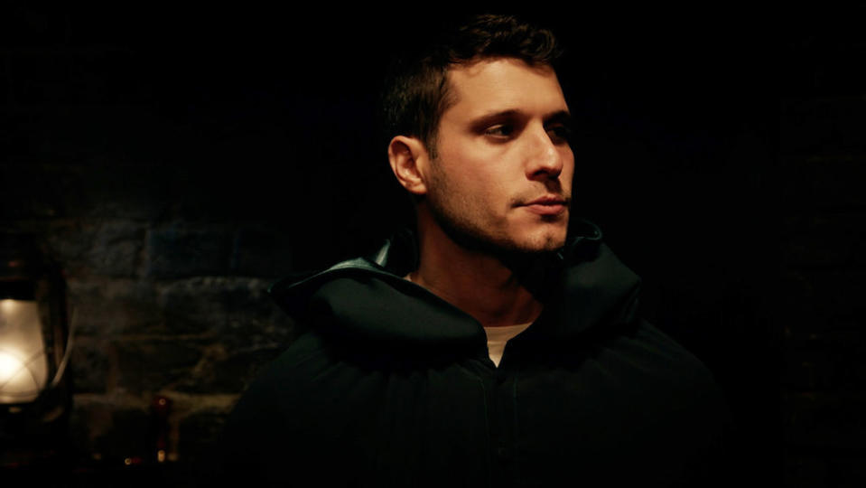 Cody Calafiore wears a hood