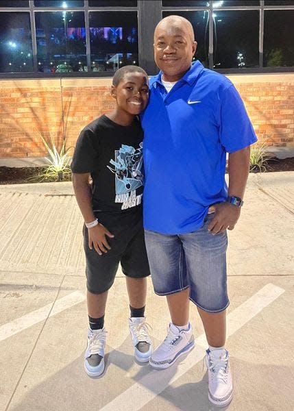 Jataeviuos Ragsdale, 11, and his father, Authur Ragsdale traveled from Mississippi to visit family in Indianapolis for the Fourth of July.