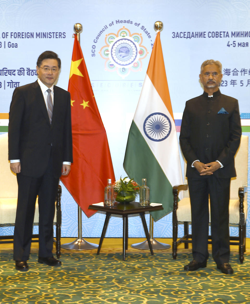 In this photo released by China's Xinhua News Agency, Chinese Foreign Minister Qin Gang, left, and India's Foreign Minister S. Jaishankar meet on the sidelines of the Shanghai Cooperation Organization (SCO) foreign ministers' meeting in Goa, India, Thursday, May 4, 2023. (Javed Dar/Xinhua via AP)