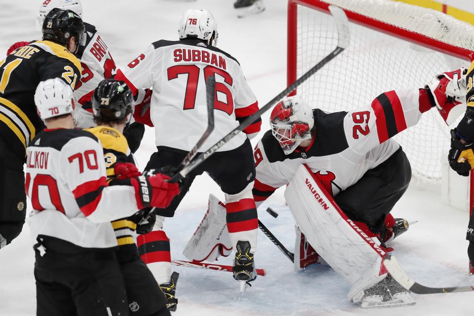 New Jersey Devils' Mackenzie Blackwood (29) moves to block a shot that was ruled no goal on review during the third period of an NHL hockey game, Sunday, March 28, 2021, in Boston. (AP Photo/Michael Dwyer)