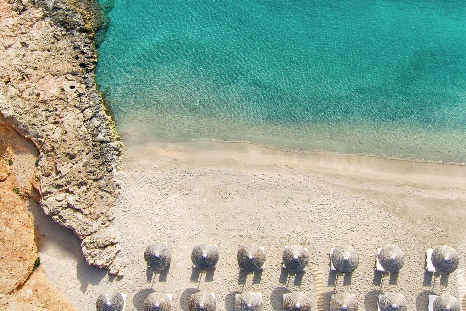 Aerial of the beach at Daios Cove Luxury Resort &amp; Villas