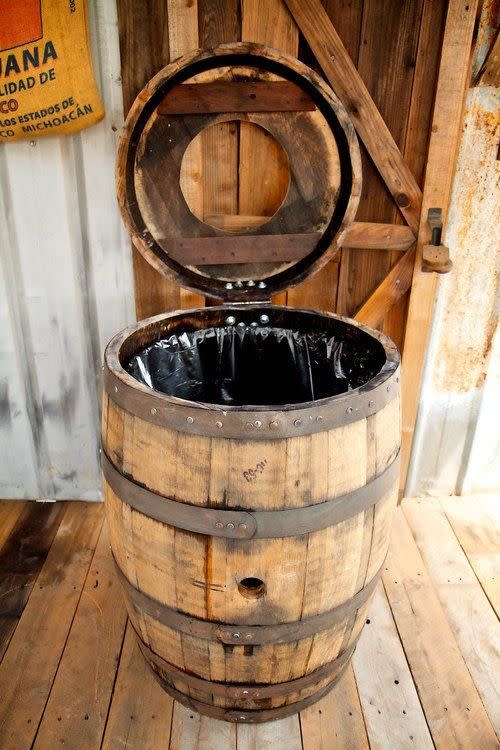 3) Whiskey Barrel Trash Can
