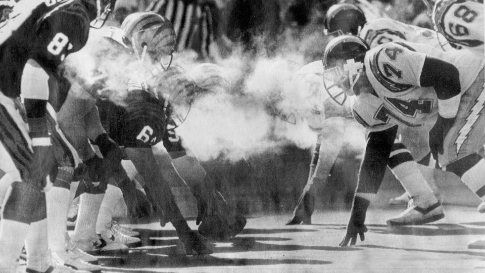 Linemen for the Cincinnati Bengals, left, and the San Diego Chargers line up in sub-zero temperatures during the AFC championship game on January 10, 1982. - Gerry Wolter/The Cincinnati Enquirer/USA Today Network