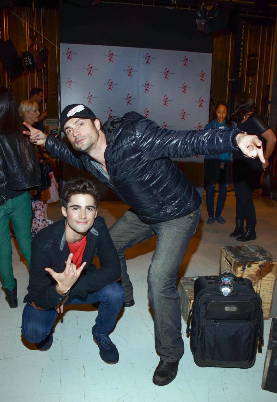 Max Ehrich and Daniel Goddard pose for a photo at "The Young And The Restless" 41st Anniversary, on Tuesday, March 25, 2014, in Los Angeles. (Photo by Tonya Wise/Invision/AP)