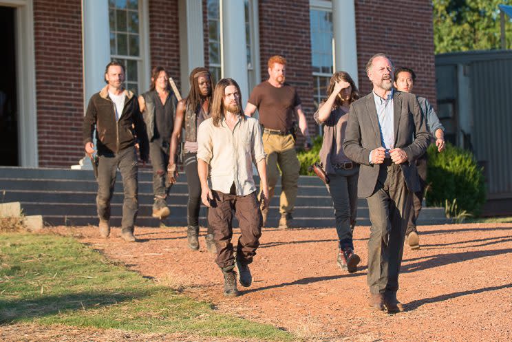 Steven Yeun as Glenn Rhee, Danai Gurira as Michonne, Michael Cudlitz as Abraham, Andrew Lincoln as Rick Grimes, Lauren Cohan as Maggie Greene, Norman Reedus as Daryl Dixon, Tom Payne as Jesus, and Xander Berkeley as Gregory (Credit: Gene Page/AMC)