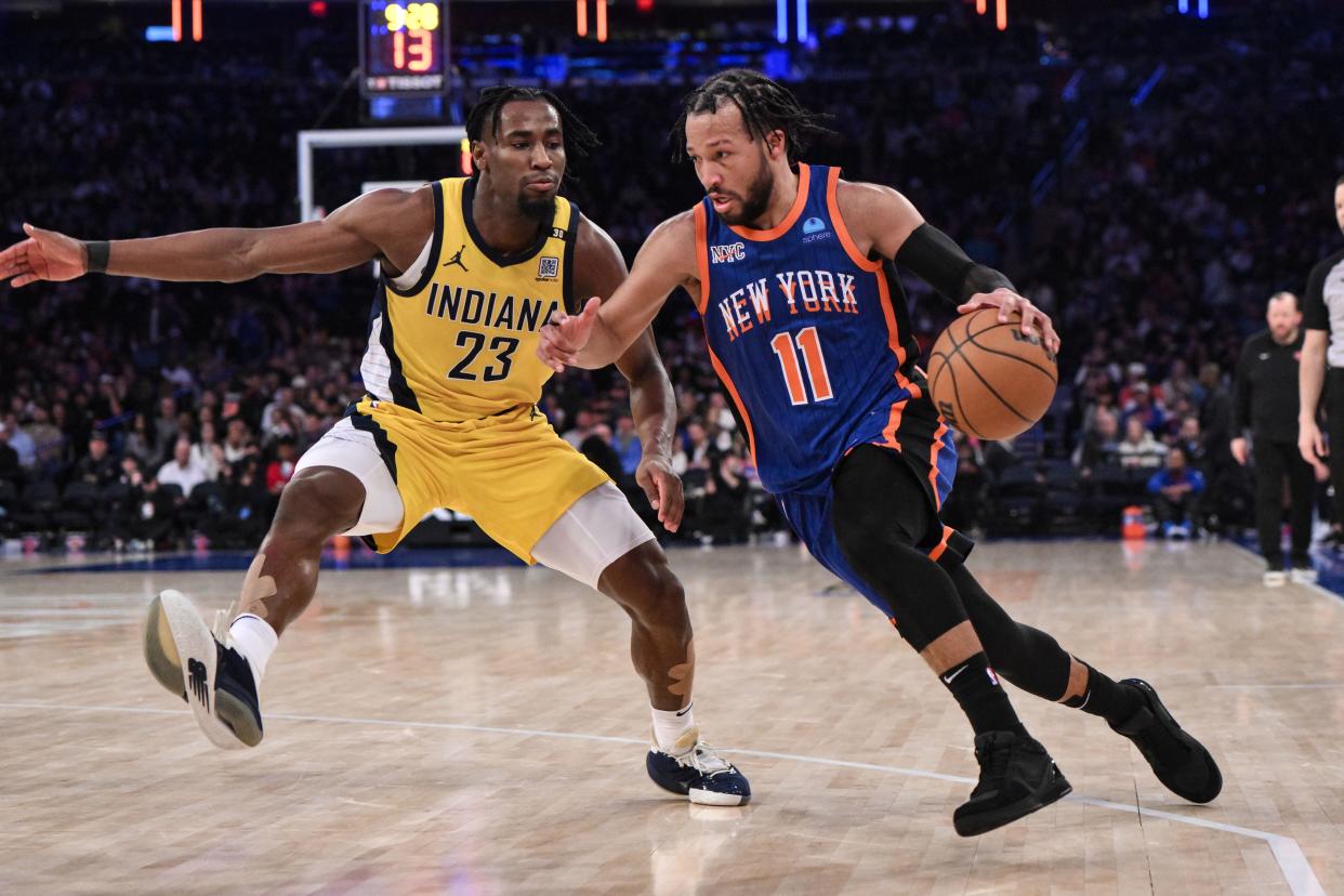 Feb 10, 2024; New York, New York, USA; New York Knicks guard Jalen Brunson (11) drives to the basket as Indiana Pacers forward Aaron Nesmith (23) defends during the third quarter at Madison Square Garden. Mandatory Credit: John Jones-USA TODAY Sports