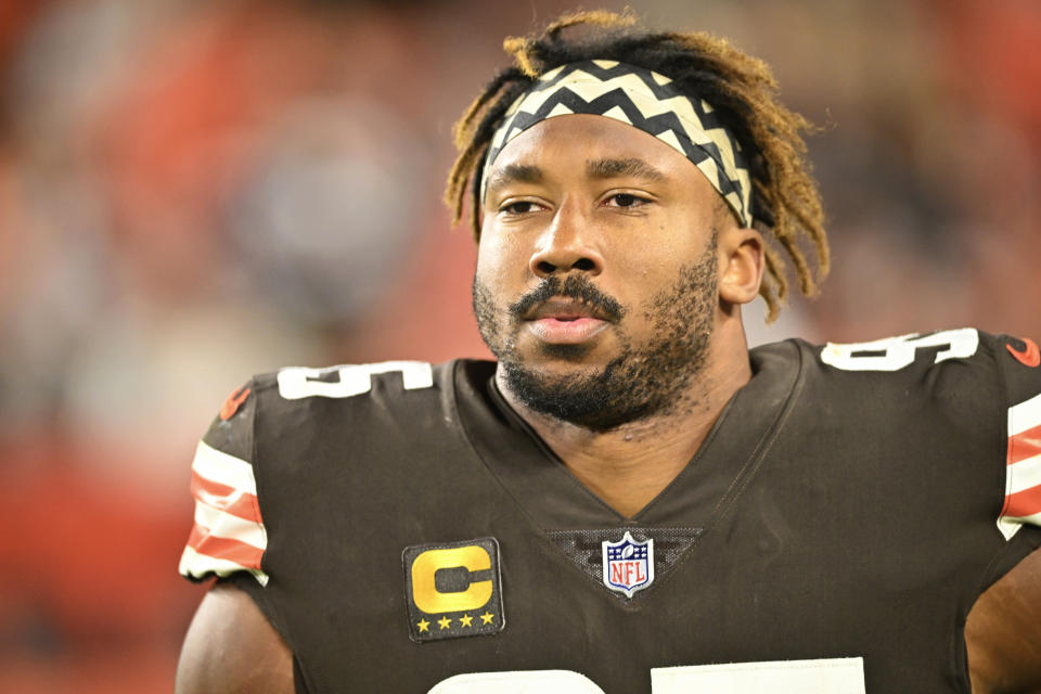 FILE - Cleveland Browns defensive end Myles Garrett (95) walks on the field during an NFL football game against the Pittsburgh Steelers, Sept. 22, 2022, in Cleveland. Garrett was released from a hospital late Monday, Sept. 26, after he was injured when he rolled over his Porsche while driving on a rural road following practice. (AP Photo/David Richard, File)