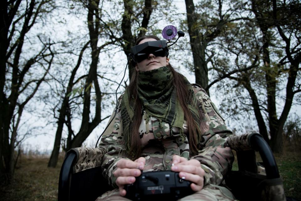 A female Ukrainian soldier with a drone remote during training