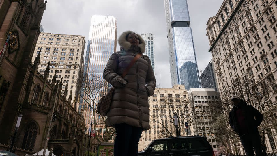 People walk through lower Manhattan moments after experiencing a 4.8 magnitude earthquake on Friday. - Spencer Platt/Getty Images