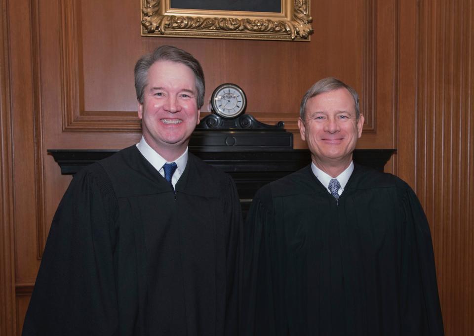 Associate Justice Brett M. Kavanaugh, left and Chief Justice John G. Roberts, Jr. in the Justices' Conference Room before a investiture ceremony Thursday, Nov. 8, 2018, at the Supreme Court in Washington.