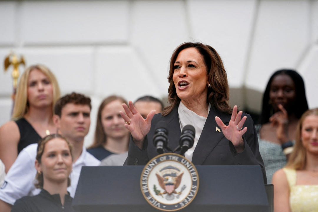 FILE PHOTO: U.S. Vice President Kamala Harris, delivers remarks to the women and men's National Collegiate Athletic Association (NCAA) Champion teams in her first public appearance since President Joe Biden dropped out of the 2024 race, on the South Lawn of the White House, Washington, U.S., July 22, 2024. REUTERS/Nathan Howard/File Photo