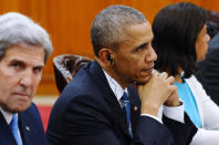 <p>U.S. president Barack Obama, center, flanked by Secretary of State John Kerry, left, and National Security Council Advisor Susan Rice holds official talks with Vietnamese Prime Minister Nguyen Xuan Phuc (not pictured) at Phuc’s Cabinet Office in May 23, 2016. Obama on Monday lifted a half-century-old ban on selling arms to Vietnam during his first visit to the communist country, looking to bolster a government seen as a crucial, though flawed partner in a region he’s tried to place at the center of his foreign policy legacy. (Hoang Dinh Nam, Pool Photo via AP). </p>