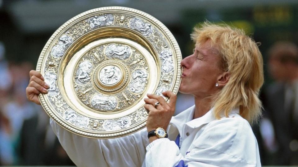 PHOTO: Martina Navratilova kisses the Venus Rosewater Dish after defeating Zina Garrison in their Women's Singles Final match at the Wimbledon Lawn Tennis Championship on July 7, 1990 at the All England Lawn Tennis and Croquet Club in Wimbledon in London. (Bob Martin/Getty Images, FILE)