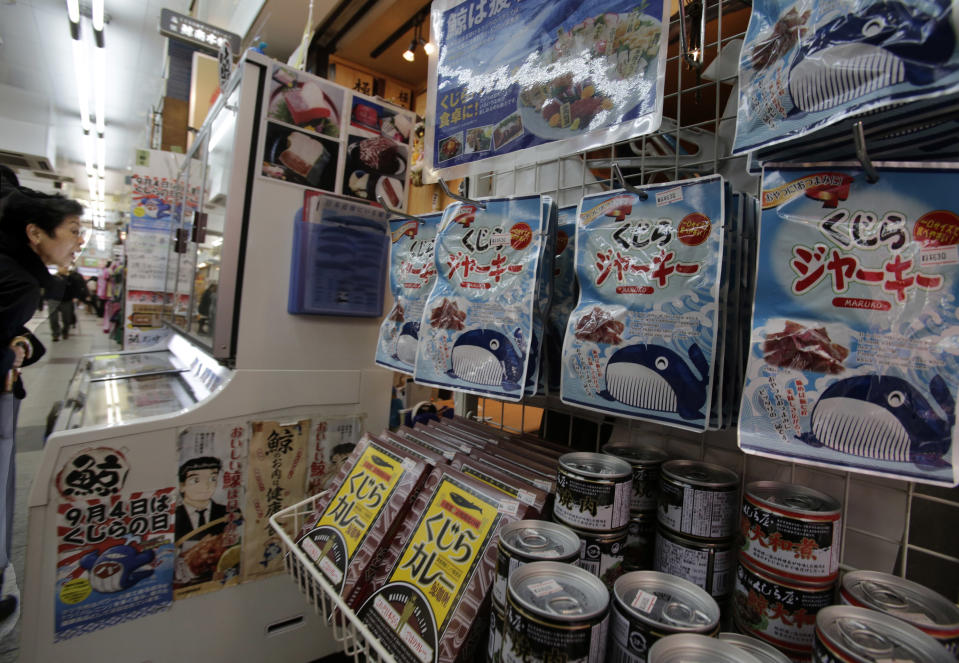 Packs of whale meat to be sold hang at a whale meat specialty store at Tokyo's Ameyoko shopping district, Thursday, March 27, 2014. The greatest threat to Japan’s whaling industry may not be the environmentalists harassing its ships or the countries demanding its abolishment, but Japanese consumers. They’ve simply lost their appetite. The amount of whale meat stockpiled for lack of buyers has nearly doubled over 10 years, even as anti-whaling protests helped drive catches to record lows. More than 2,300 mink whales worth of meat is sitting in freezers while whalers still plan to catch another 1,300 whales per year. Uncertainty looms ahead of an International Court of Justice ruling expected Monday over a 2010 suit filed by Australia, which argues that Japan’s whaling - ostensibly for research - is a cover for commercial hunts. (AP Photo/Shizuo Kambayashi)