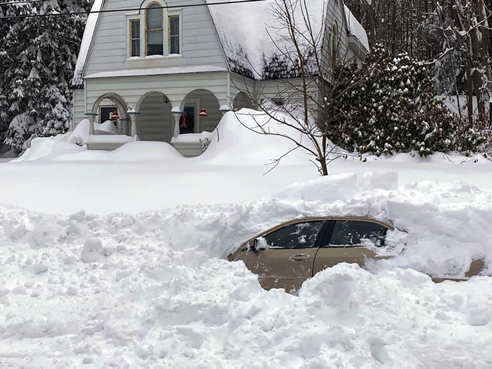 CORRECTS CITY TO OWEGO, N.Y. This photo, provided by the New York State Police, shows a car, in Owego, NY, from which a New York State Police sergeant rescued Kevin Kresen, 58, of Candor, NY, stranded for 10 hours, covered by nearly 4 feet of snow thrown by a plow during this week's storm. Authorities say the New York State Police sergeant rescued Kresen stranded for hours in a car covered by nearly 4 feet of snow thrown by a plow during this week’s storm. The 58-year-old Candor man drove off the road and got plowed in by a truck. (New York State Police via AP)