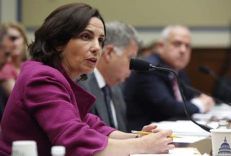 Former Internal Revenue Service (IRS) counsel Jennifer O'Connor, currently of the White House Counsel's Office, testifies about e-mails of former IRS official Lois Lerner during a House Oversight and Government Reform Committee hearing on Capitol Hill in Washington June 24, 2014. REUTERS/Jonathan Ernst