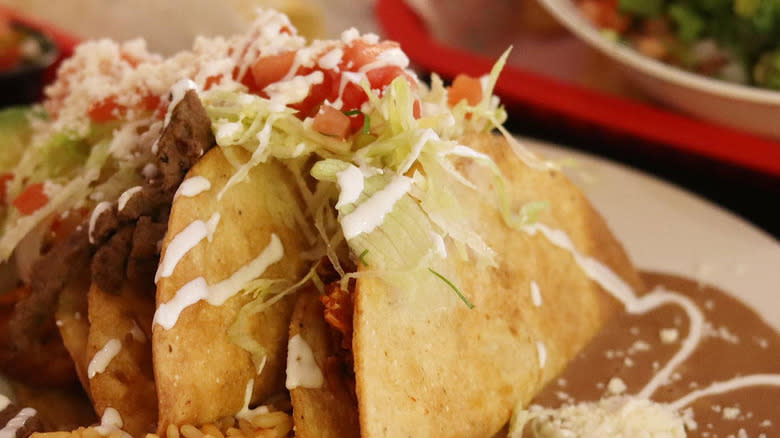 closeup of tacos with beans