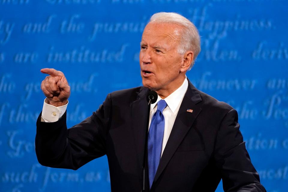 Former Vice President Joe Biden points at President Donald Trump while making a point during Thursday's debate.