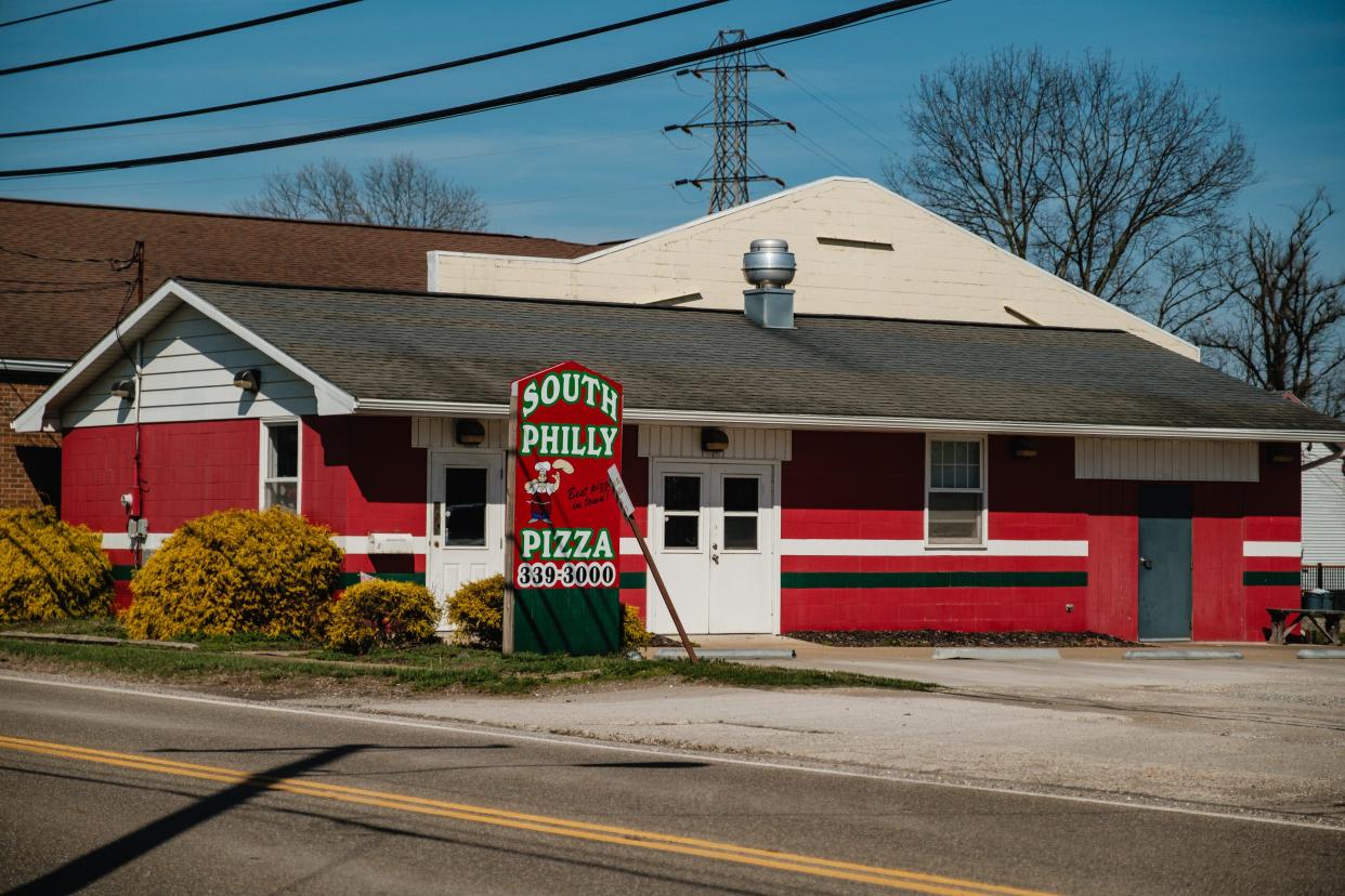 South Philly Pizza is one of many businesses concerned with the city's proposal to sell or lease portions of a 4.66-acre tract on the south side of New Philadelphia that businesses have used for many years.