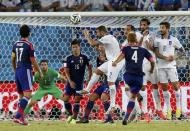 Japan's Keisuke Honda (4) fails to score during their 2014 World Cup Group C soccer match against Greece at the Dunas arena in Natal June 19, 2014. REUTERS/Toru Hanai