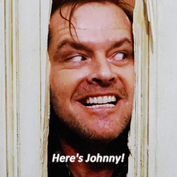 Jack Nicholson in "The Shining" saying "Here's Johnny!"