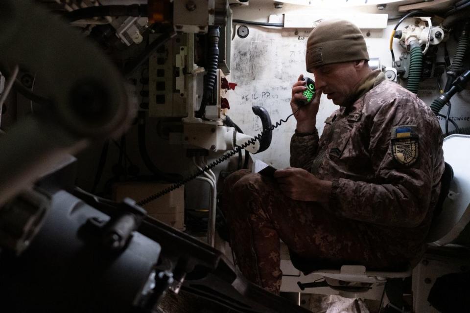 Ukrainian artillery crew commander Vitalii "Skyba" inside a M109 self-propelled howtizer at positions in Donetsk Oblast on Feb. 3, 2023. (Francis Farrell/The Kyiv Independent)