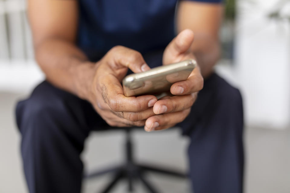 Man with phone in hands