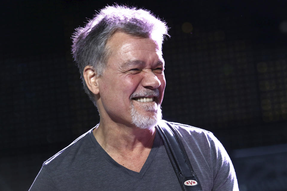 FILE - Eddie Van Halen of Van Halen performs on Aug. 13, 2015, in Wantagh, N.Y. Van Halen, who had battled cancer, died Tuesday, Oct. 6, 2020. He was 65. (Photo by Greg Allen/Invision/AP, File)