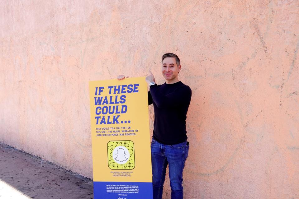 Bernard Acoca, CEO of the El Pollo Loco restaurant chain, by a blank wall that once was home to a classic Los Angeles mural. El Pollo Loco is working with Snapchat on an augmented reality campaign to restore the murals