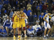 Iowa State's Gabe Kalscheur (22) and Aljaž Kunc (5) celebrate their 64-58 victory over Creighton as Ryan Nembhard (2) exits the court in an NCAA college basketball game Saturday, Dec. 4, 2021, at CHI Health Center in Omaha, Neb. Iowa State defeated Creighton 64-58. (AP Photo/Rebecca S. Gratz)