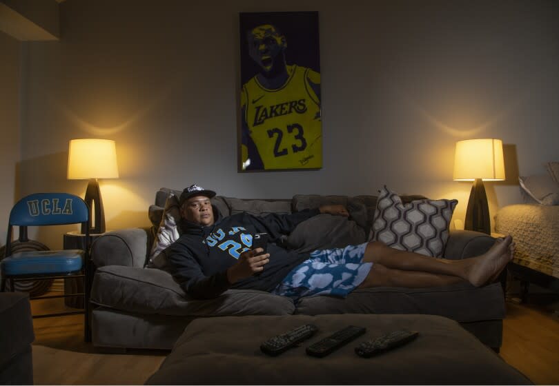 LOS ANGELES, CA - MAY 25: Josiah Johnson is the NBA Twitter's meme king. He dispatches his social media missives from the comfort of his sofa. Photographed on Wednesday, May 25, 2022. (Myung J. Chun / Los Angeles Times)
