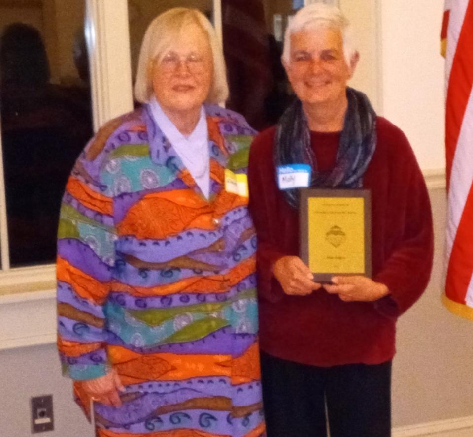 Molly Rodgers, right, was honored on April 25, 2024, by Downtown Hawley Partnership for outstanding community service, notably with local library services and currently as a principal with Lackawaxen River Trails. At left is DHP President Elaine Herzog at the awards dinner at the Hawley United Methodist Church Great Hall.