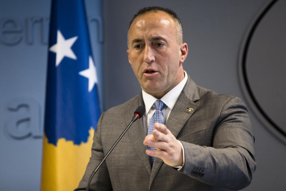 Kosovo prime minister Ramush Haradinaj, speaks to the media during a press conference in Kosovo capital Pristina on Tuesday, Dec. 18, 2018. Haradinaj blamed Europe Union's foreign policy chief for "deviating the dialogue" on normalizing ties with Serbia. Haradinaj said that, while Serbia is taking major steps toward the integration with the bloc, his country's residents have remained "in a ghetto," not enjoying the visa-free travel to EU countries though it has fulfilled all requirements. (AP Photo/Visar Kryeziu)