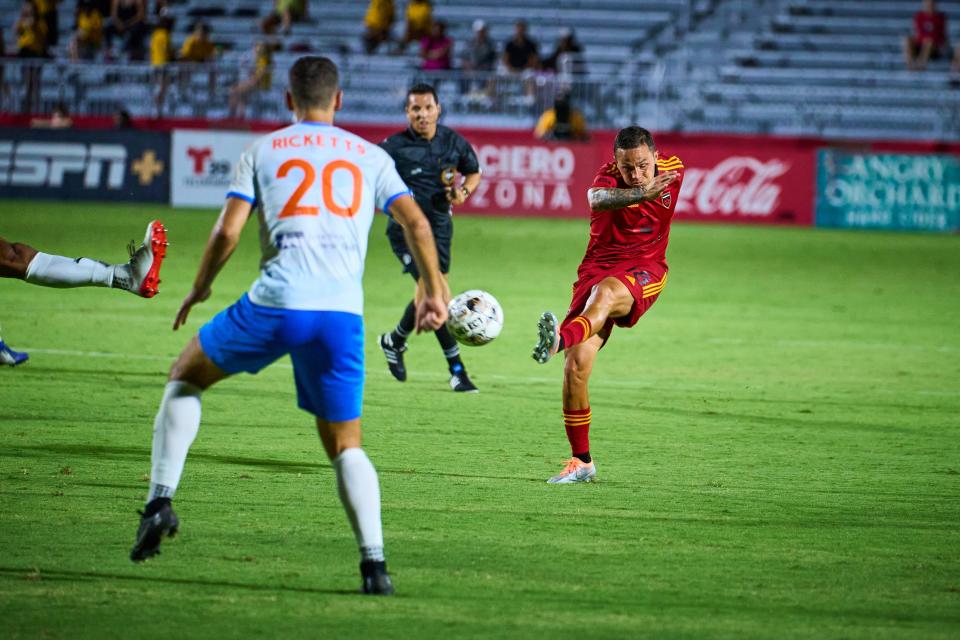 Aug 31, 2022; Chandler, Arizona, USA; Phoenix Rising midfielder Luis Seijas (18) passes against RGV Toros defender Jonathan Ricketts (20) at Phoenix Rising FC Stadium.