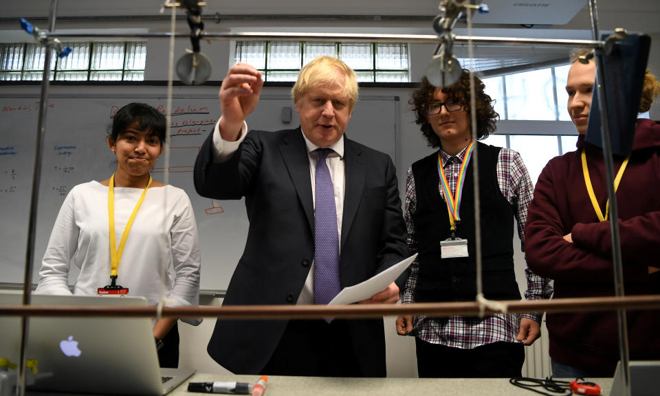 Britain's Prime Minister Boris Johnson reacts as he listens to students during his visit to King's Maths School, part of King's College London University, in central London, Britain January 27, 2020. Daniel Leal-Olivas/Pool via REUTERS