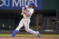 Texas Rangers' Josh Smith connects for a single to left inthe sixth inning of a baseball game against the Tampa Bay Rays, Monday, May 30, 2022, in Arlington, Texas. (AP Photo/Tony Gutierrez)