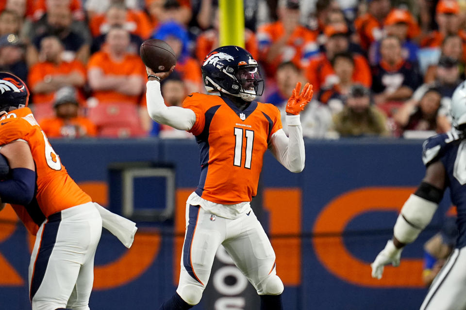 Denver Broncos quarterback Josh Johnson (11) throws against the Dallas Cowboys during the first half of an NFL preseason football game, Saturday, Aug. 13, 2022, in Denver. (AP Photo/Jack Dempsey)