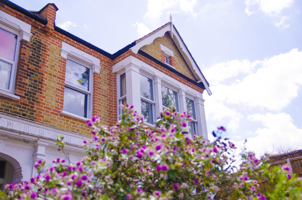 UK house price British house with flowers