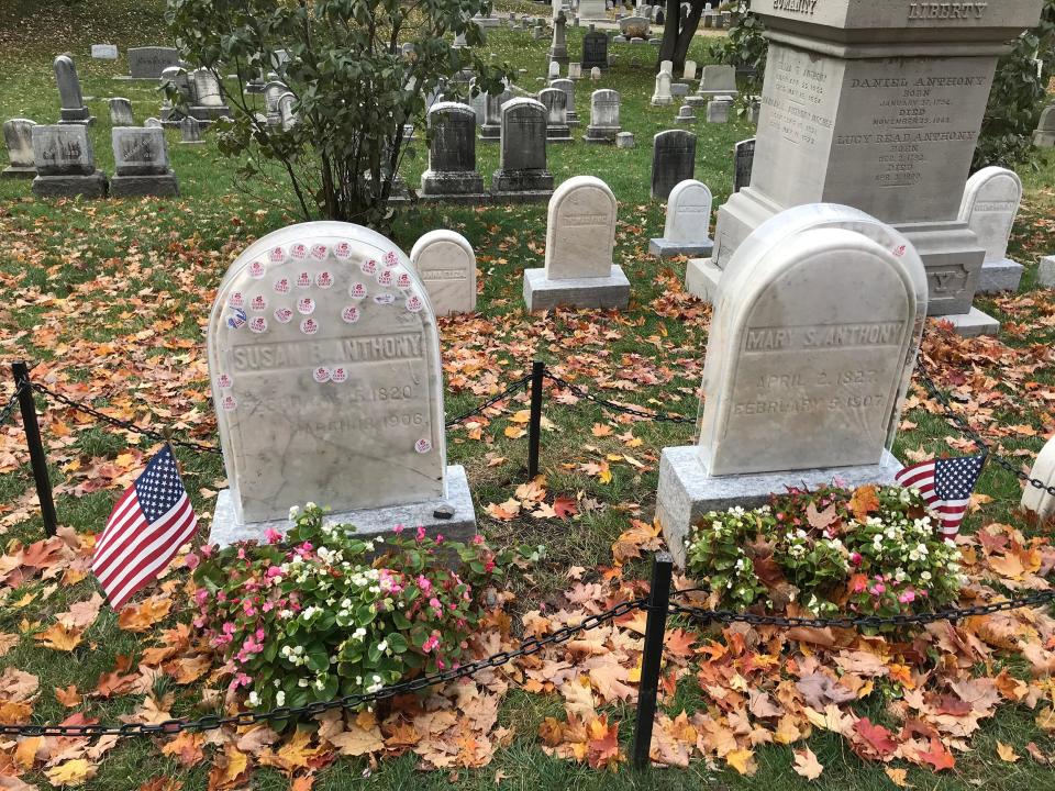 A plastic cover was placed over the headstones of Susan B. Anthony and her sister, Mary Anthony, to protect them from damage caused by stickers. Early voters on Oct. 24, 2020, started placing stickers on both graves.