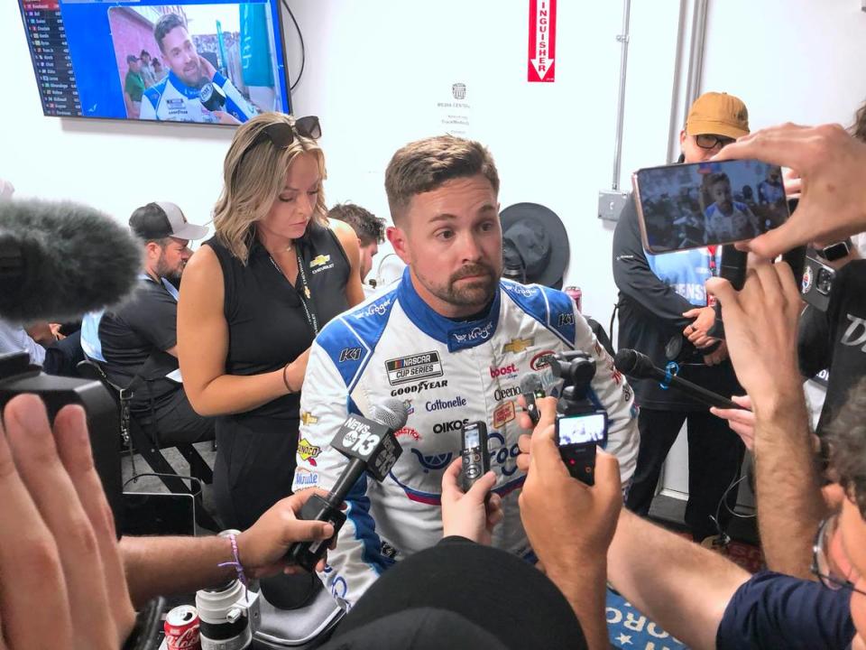 NASCAR Cup Series driver Ricky Stenhouse Jr., center, speaks to the media after being knocked out of the NASCAR All-Star race in the early stages at North Wilkesboro Speedway in North Wilkesboro, NC on Sunday, May 19, 2024.